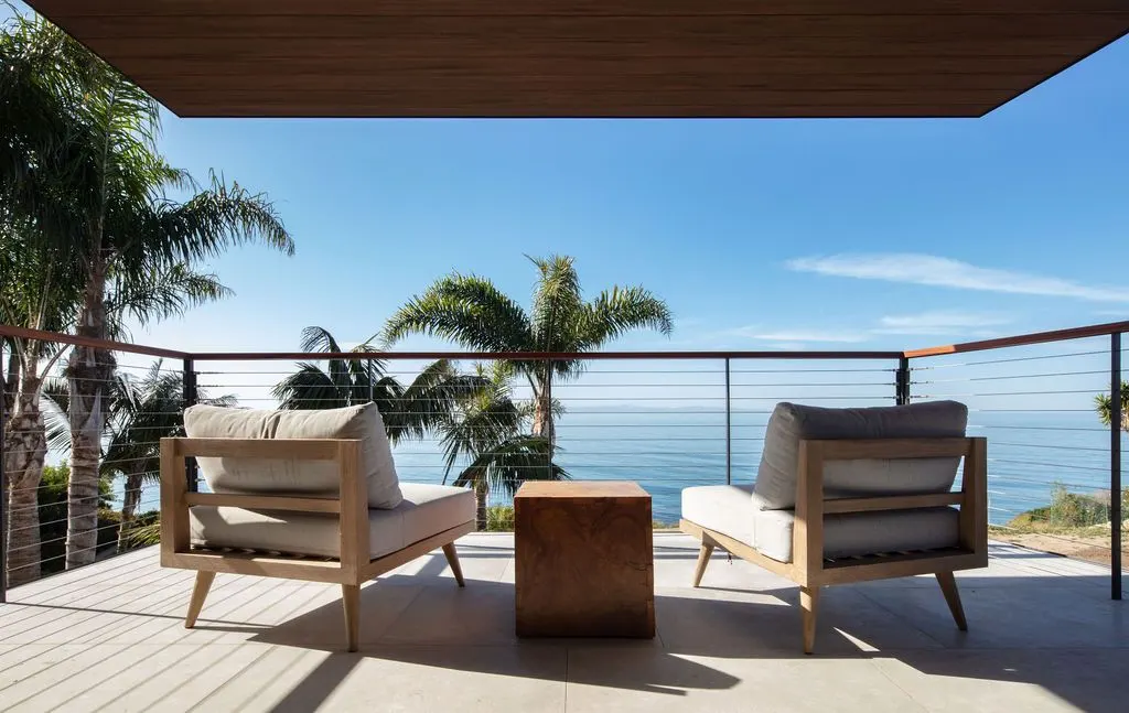 Oceanfront deck with glass railing on the Santa Barbara coast