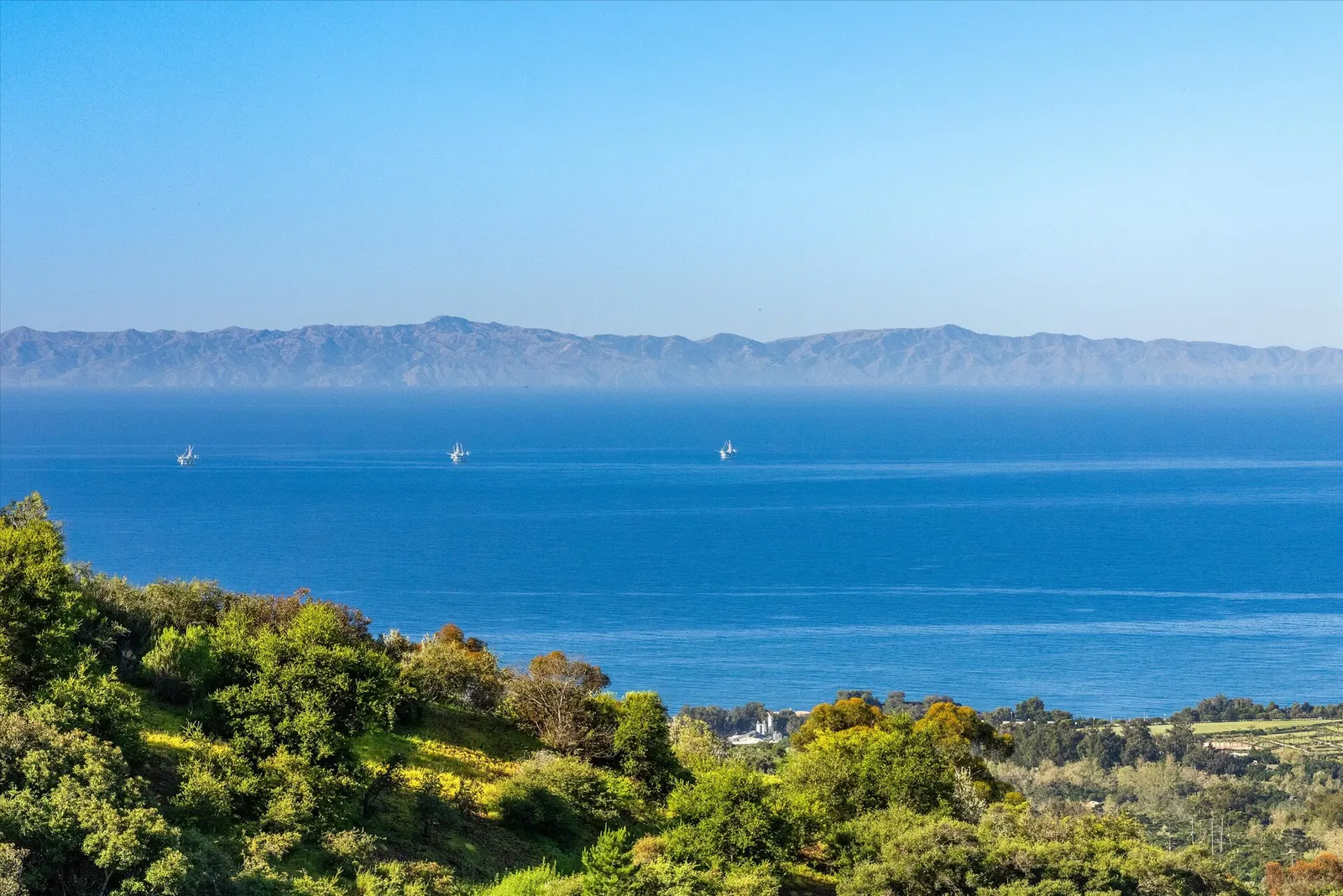 Ocean and coastline view from a custom hillside home
